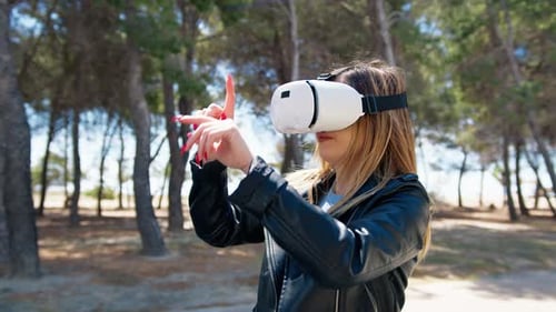 Woman Experiences Virtual Reality in Sunny Park