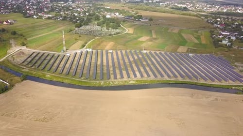 Aerial View of Solar Power Plant Electric Panels for Producing Clean Ecologic Energy