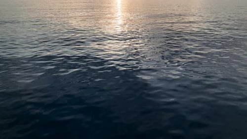 Texture of Water Surface of Sea Reflection of Sun's Rays
