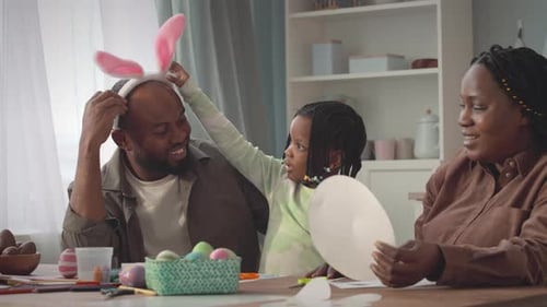 African American Family of Three Celebrating Easter
