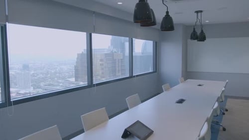 Slow Panning Shot Of A Stylish And Modern Meeting Room In A Corporate Office With A High And Breatht
