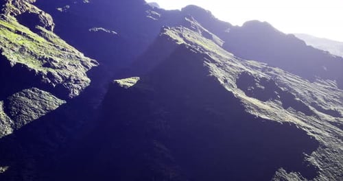 Majestic Mountain Landscape Showcasing Rocky Peaks and Lush Greenery