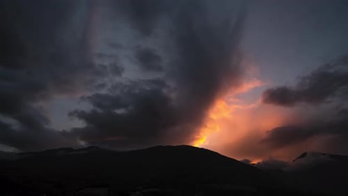 epic sunset over the mountains, while golden hour.