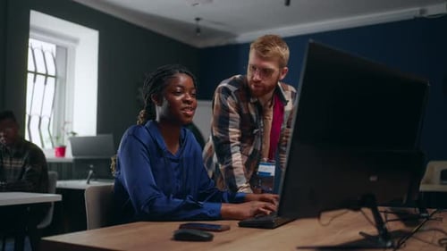 Education of Programmer and Data Scientist in Learning Center Black Woman is Writing Program