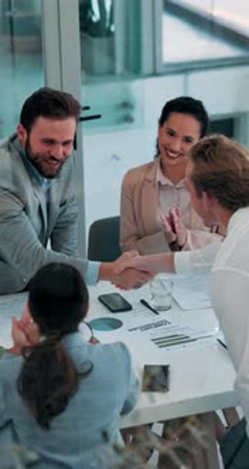 Business, people and applause with handshake in office for investment collaboration