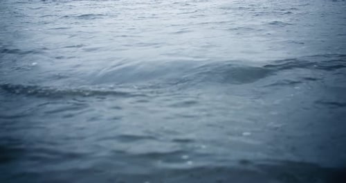 Waves Gently Moving in Ocean Blue Water