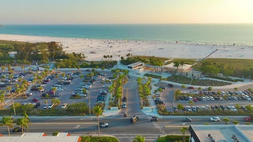 Aerial View of Rental Apartment Buildings and Parking Lot for Tourists Cars in Front of Famous