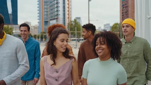 Group of Friends Walking and Talking in the City
