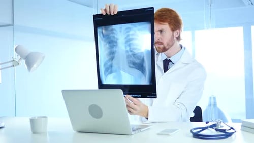 Specialist Doctor Checking Xray of Patient for Diagnosis