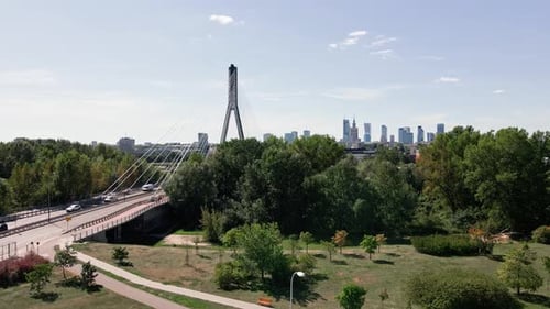 Aerial View of Warsaw Cityscape with Skyscrapers and Bridge Over River