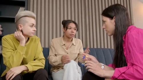 Women Talking with Therapist in Modern Interior