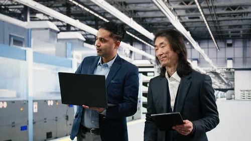 Microchip Manufacturing Plant Multiethnic Engineering Team Tracks Semiconductors