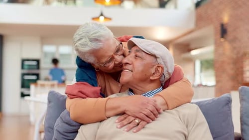 Affectionate Senior Couple Embracing at Home