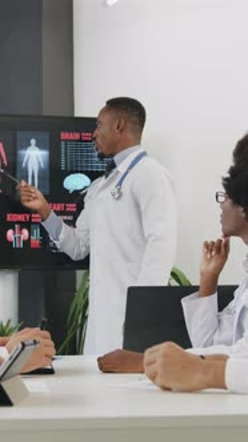 Goodlooking Concentrated Successful Highskilled Medical Colleagues Listening Presentation About
