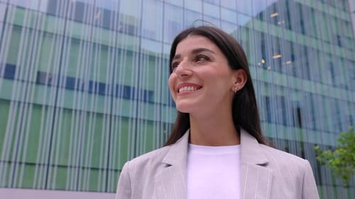 Portrait of Young Entrepreneur Woman Standing Over Modern Company Office