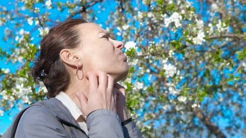 Female Scratches Her Pollen Itchy Body