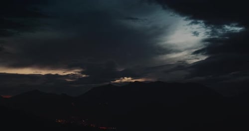 Late Evening Sunset Timelapse of Cloudscape on Mountain Landscape