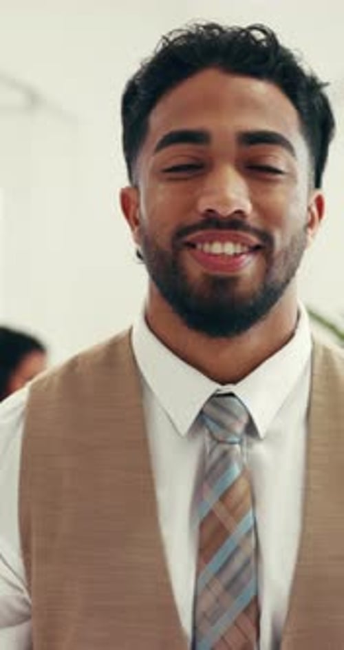 Smile, face and concierge with man in hotel for hospitality, support and booking assistance