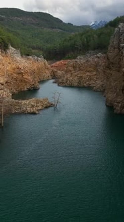 Vertical Video Serene Mountain Reservoir and Diverse Farming in Southern Turkey