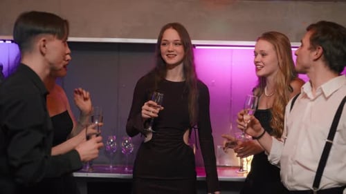 Young Adults Enjoying a Champagne Party Gathering