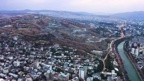 Aerial view of rush hour in the evening at streets and highways of Tbilisi, Georgia