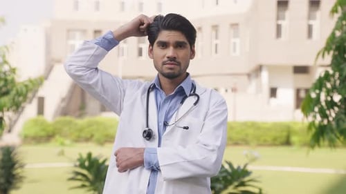 Confused Indian Doctor Looking in the Camera