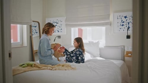 Cheerful Mother Kid Playing Together at Bedroom Closeup Family Clapping Hands
