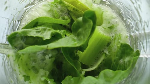 Closeup Greens Blending Electric Mixer in Super . Top View Of