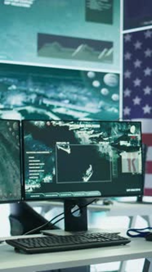 Futuristic Monitors Displaying Strategic War Data