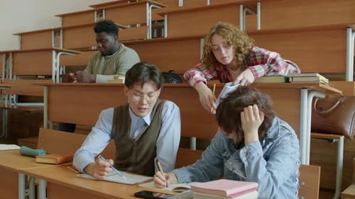 Students Collaborating in Tiered Lecture Hall Classroom