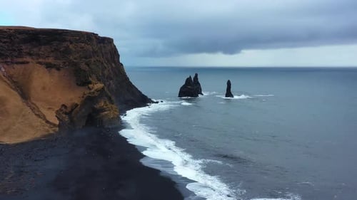 Black Sand Beach with Huge Waves Aerial Cinematic Video Beautiful Nature in Iceland Coastline From