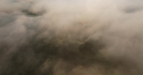 Drone View Above Dense Fluffy White Clouds
