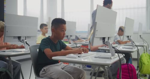 Elementary School Children Using Computers Doing Creative 3D Design Projects