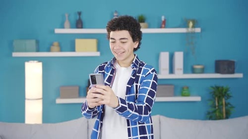 Teen Using Smartphone in Colorful Room