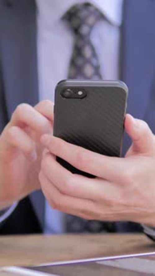 Close Up of Businessman Using Smartphone, Vertical Video