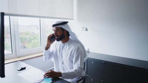 businessman working in a modern office in the united arab emirates.