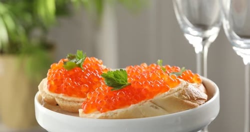 Caviar Appetizers Served on a White Plate