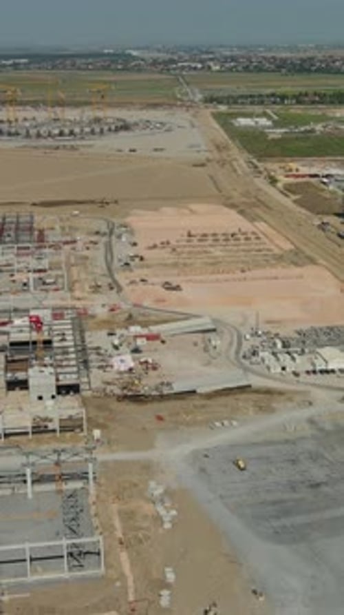Industrial construction site with construction equipment