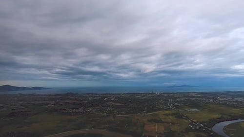 Looking at the clouds and Da Nang city in the airplane in Asia.