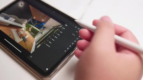 Photographer editing photo on digital tablet, before and after color correction