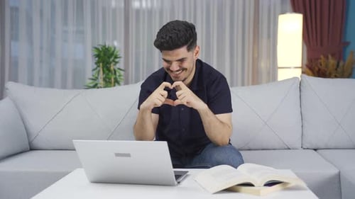 Young Man on Video Call in Living Room