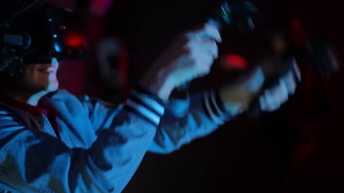 Young Adult Enjoys Virtual Reality Gaming