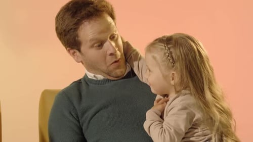 Father and Daughter Talk and Laugh Together