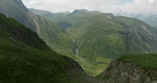 Aerial Cinematic Dolly View The Grimsel Pass In The Alps In Switzerland With Tilt Down Reveal Shot