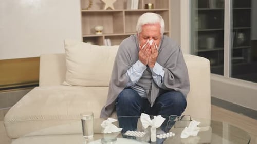 Healthcare Medicine Senior Man with High Fever Symptoms Illness Cold Seasonal Influenza Holding