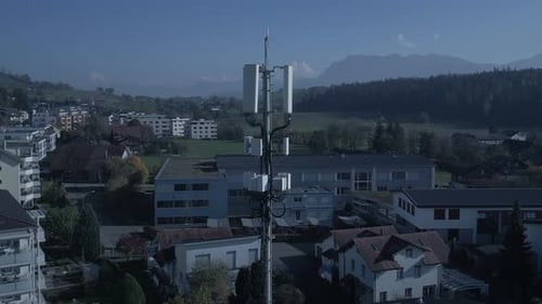Telecommunication Tower Standing Tall and Overlooking a Beautiful Scenic Landscape Below