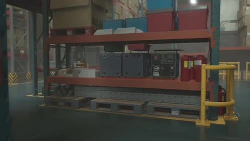 Nighttime View of an Empty Warehouse With Stocked Shelves