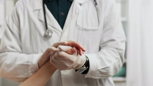 Hospital. Medical professional in doctor's clothes holding doctor's appointment in the doctor's room