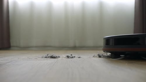 Robot Vacuum Cleaner Cleaning Wood Floor