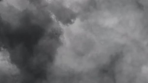 flying through into dark cumulonimbus clouds
